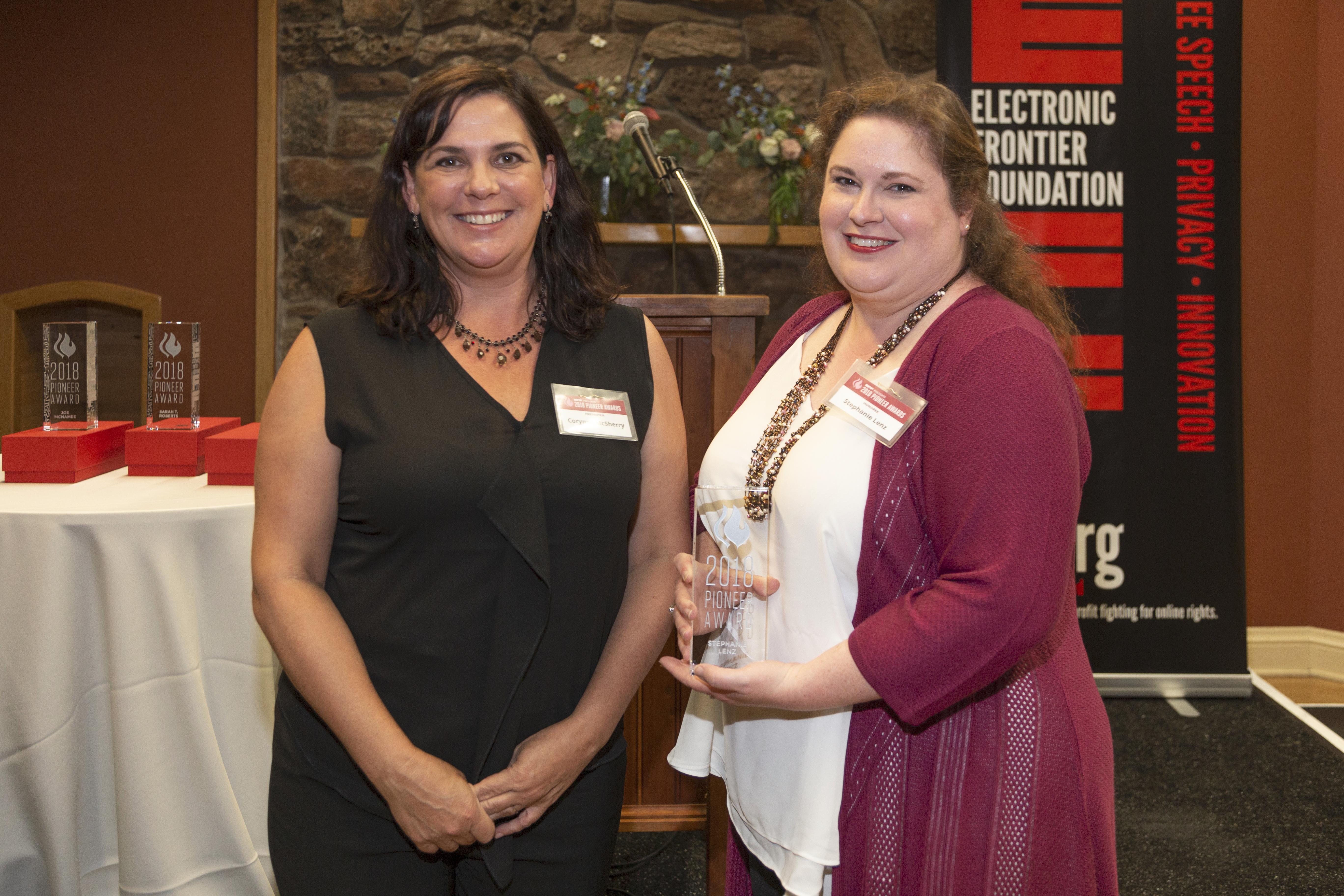 EFF's Legal Director, Corynne McSherry and "Barlow" winner Stephanie Lenz pose with Stephanie's award.