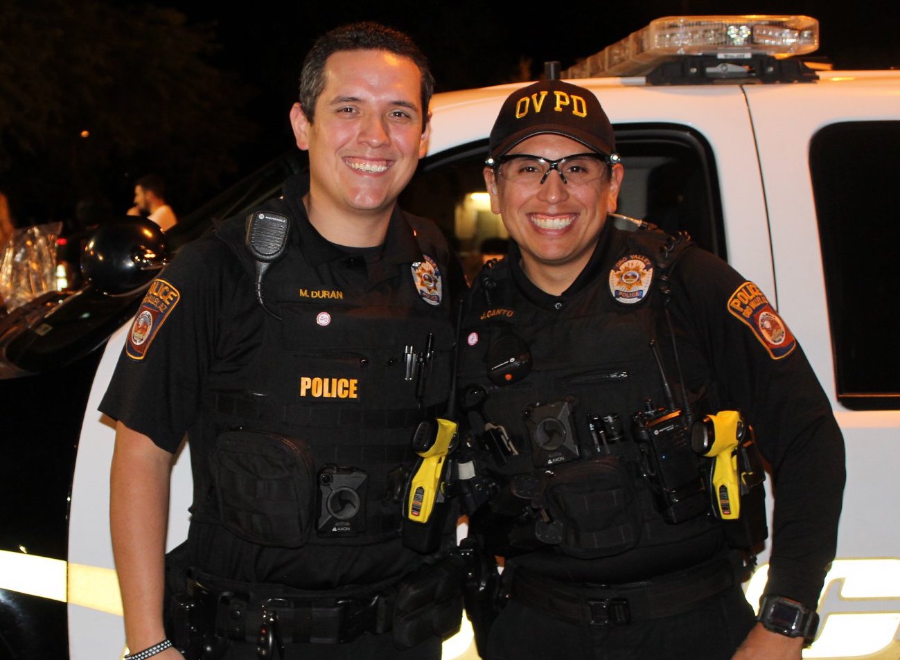 Two police officers wearing body cameras