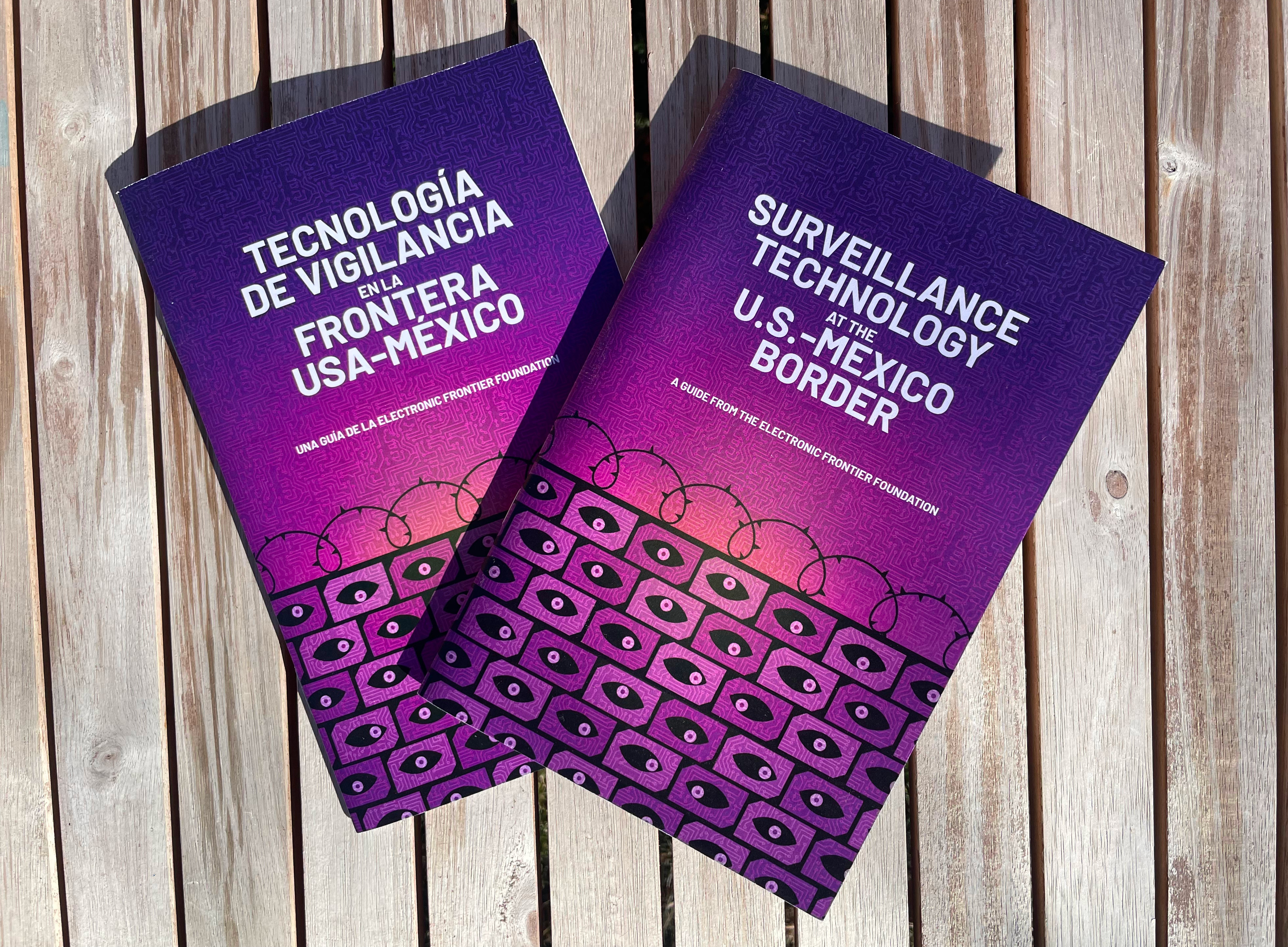 Two copies of the purple-themed Border Surveillance Technology zine.